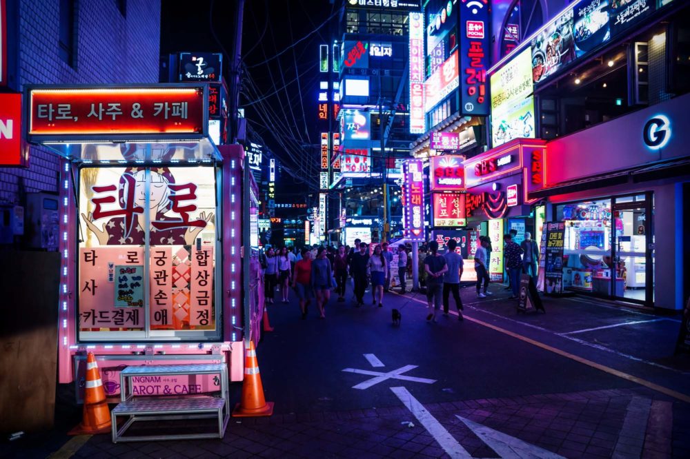 Gangnam shopping street with colorful neon lights at night in Seoul, South Korea