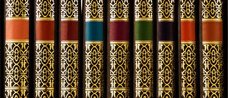 | PORTFOLIO | books with golden decoration