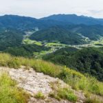 View into the valley with fields and hills from the top of Maisan mountain, horse ear mountain, Maryeong-myeon, South Korea