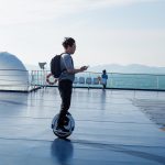 Ferry from Jeju Island to Mokpo, around Jindo islands, South Korea Tourist on a electric monowheel on deck of ferry from Jeju to Mokpo