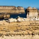 Details of the The Razorback yellow limestone cliff in the ocean at a sunny day at the Great Ocean Road, Victoria, Australia