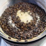 Pot with boiling beondegi, Silkworm pupae, Korean Streetfood at Jeju Island, Seogwipo